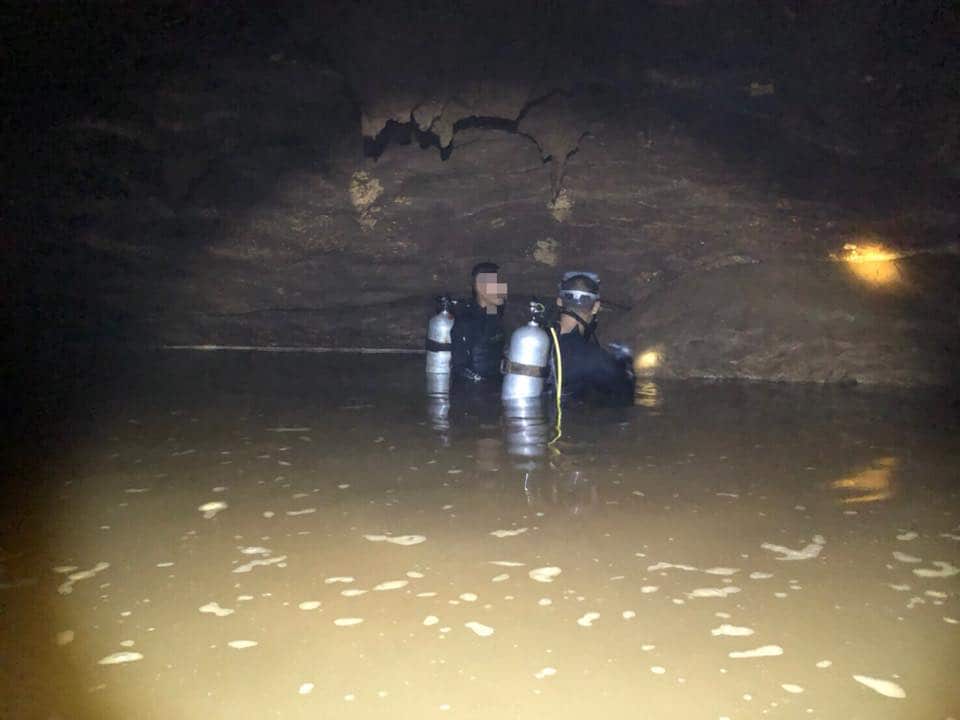 Thai navy divers search the cave complex for the missing boys.