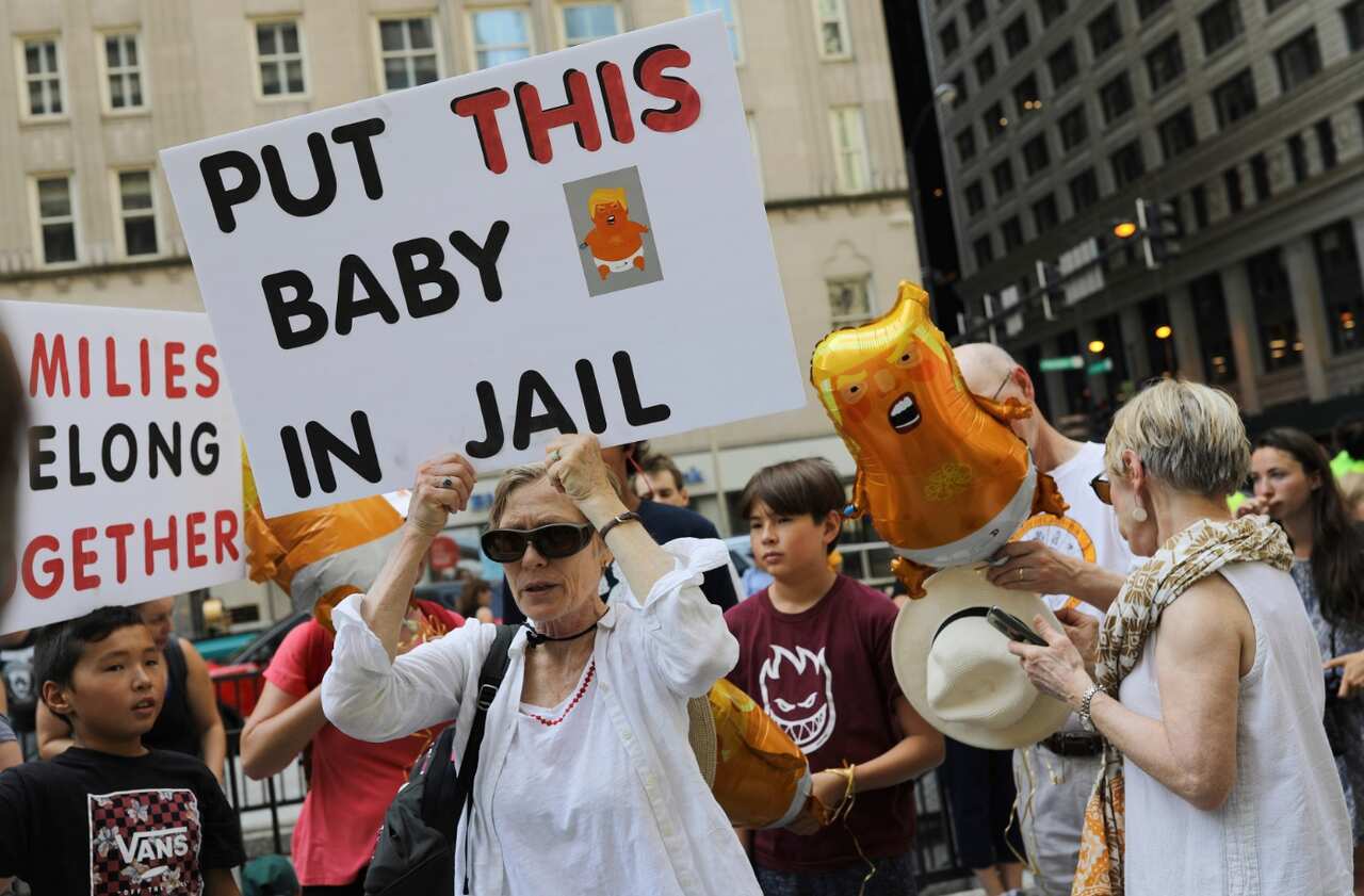 Thousands of people, including immigrants and their supporters, rally against President Trump's immigration policy