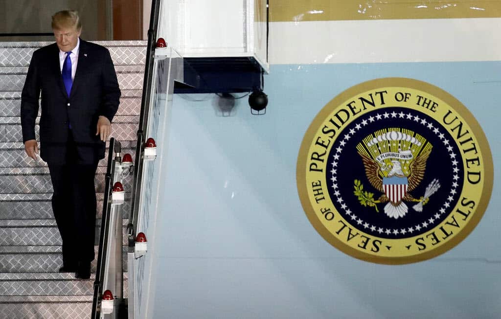 President Donald Trump arrives aboard Air Force One at Paya Lebar Air Base June 10, 2018 in Singapore