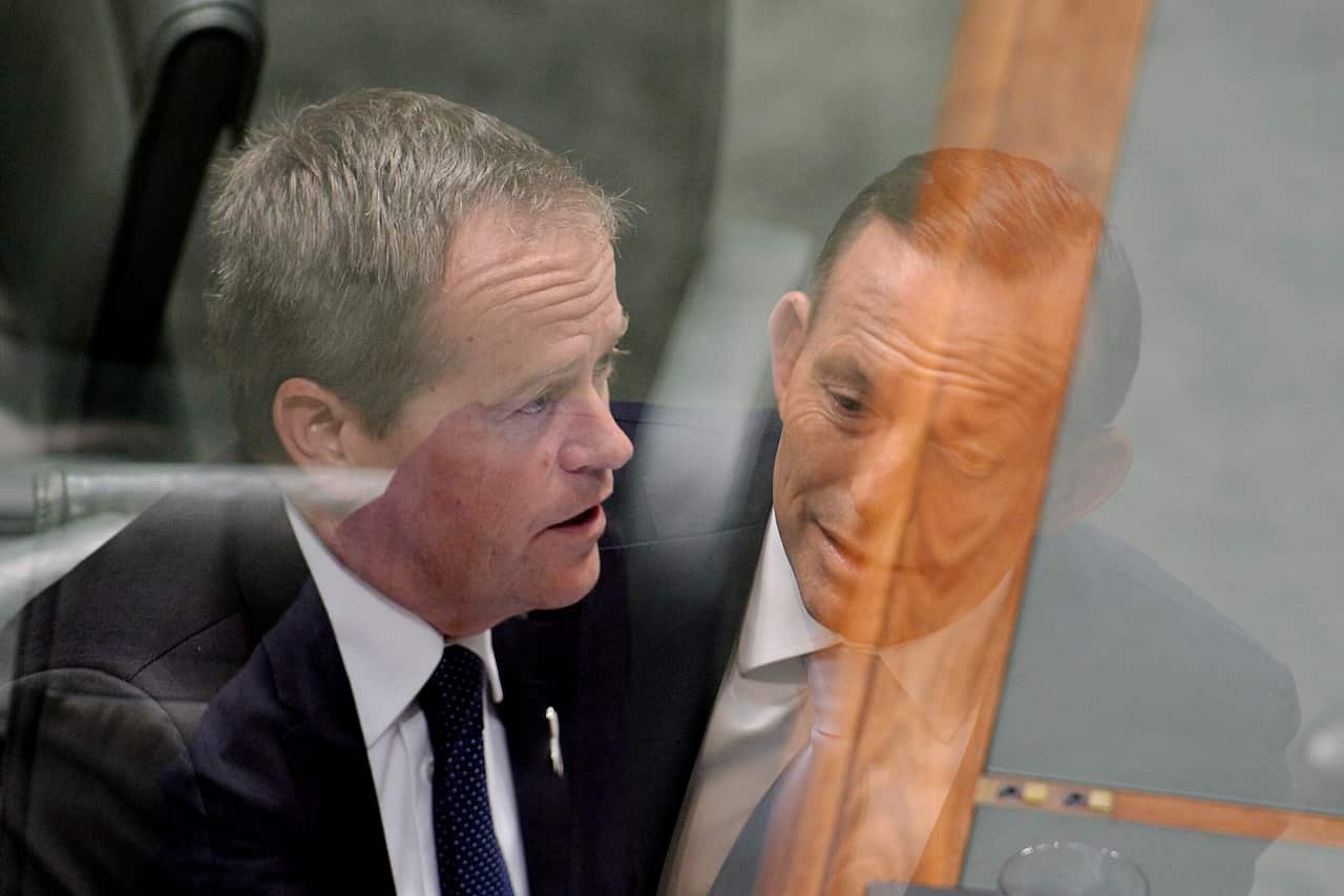 Double exposure picture of Tony Abbott and Bill Shorten (AAP)