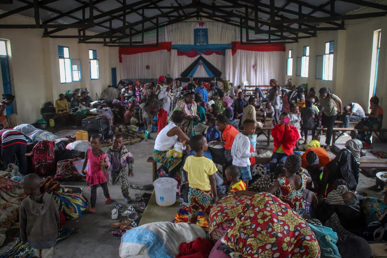 Displaced people take shelter in a church in the town of Sake, northwest of Goma, in eastern Congo on 28 May 2021.