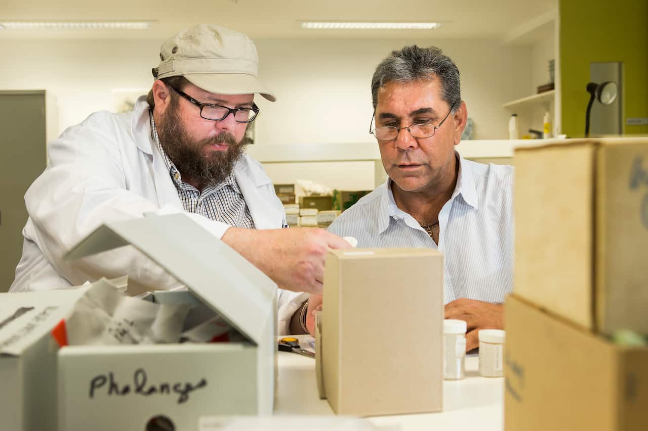 Dr Daryl Wesley and Steve Meredith with the remains of Mungo Man, being packaged to be returned to where he was found.
