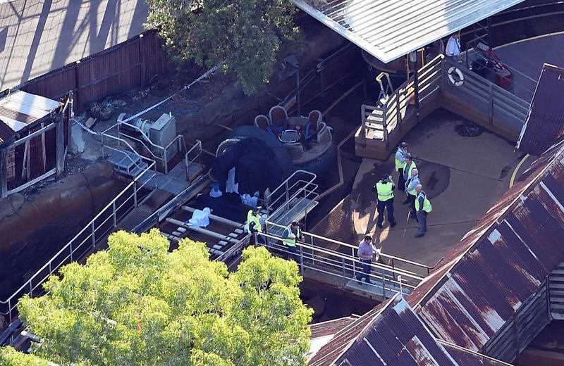 Queensland Emergency service personnel are seen at amusement theme park Dreamworld where four people died on the Gold Coast, Queensland, Tuesday, Oct. 25, 2016.