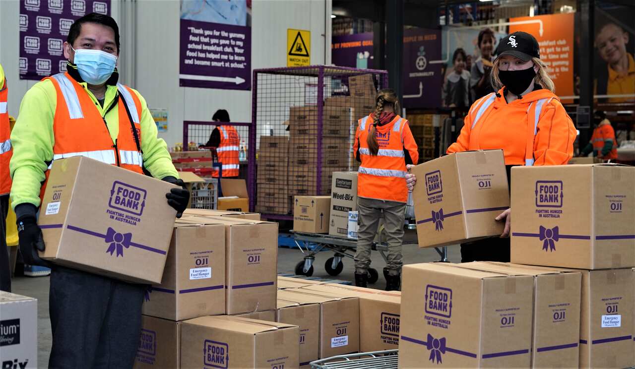 Foodbank staff and volunteers are busy packing hampers in Sydney's west.