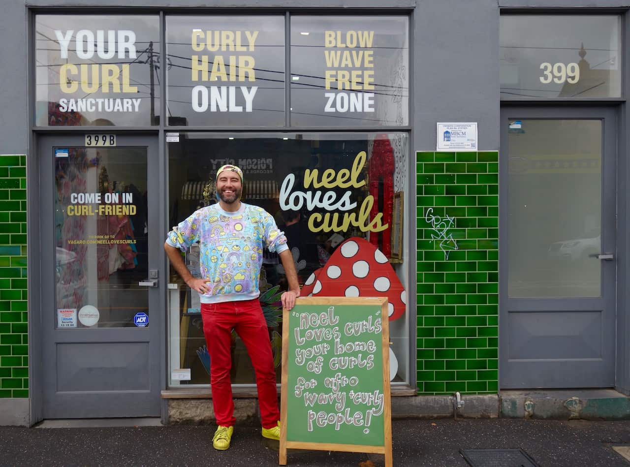 Since moving to Australia 15 years ago, Neel Morley has become known as 'the curly hair man'.
