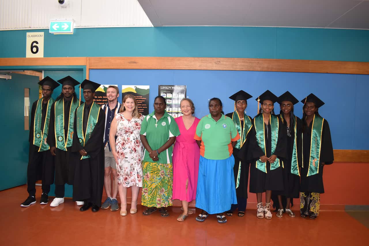 The graduating students and staff