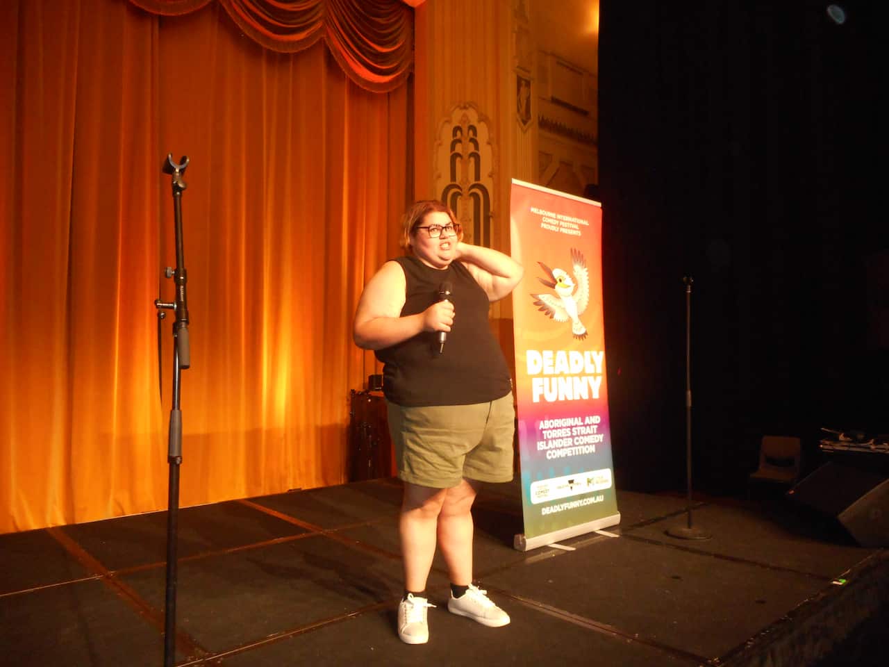 Kimmie Lovegrove on stage at Deadly Funny
