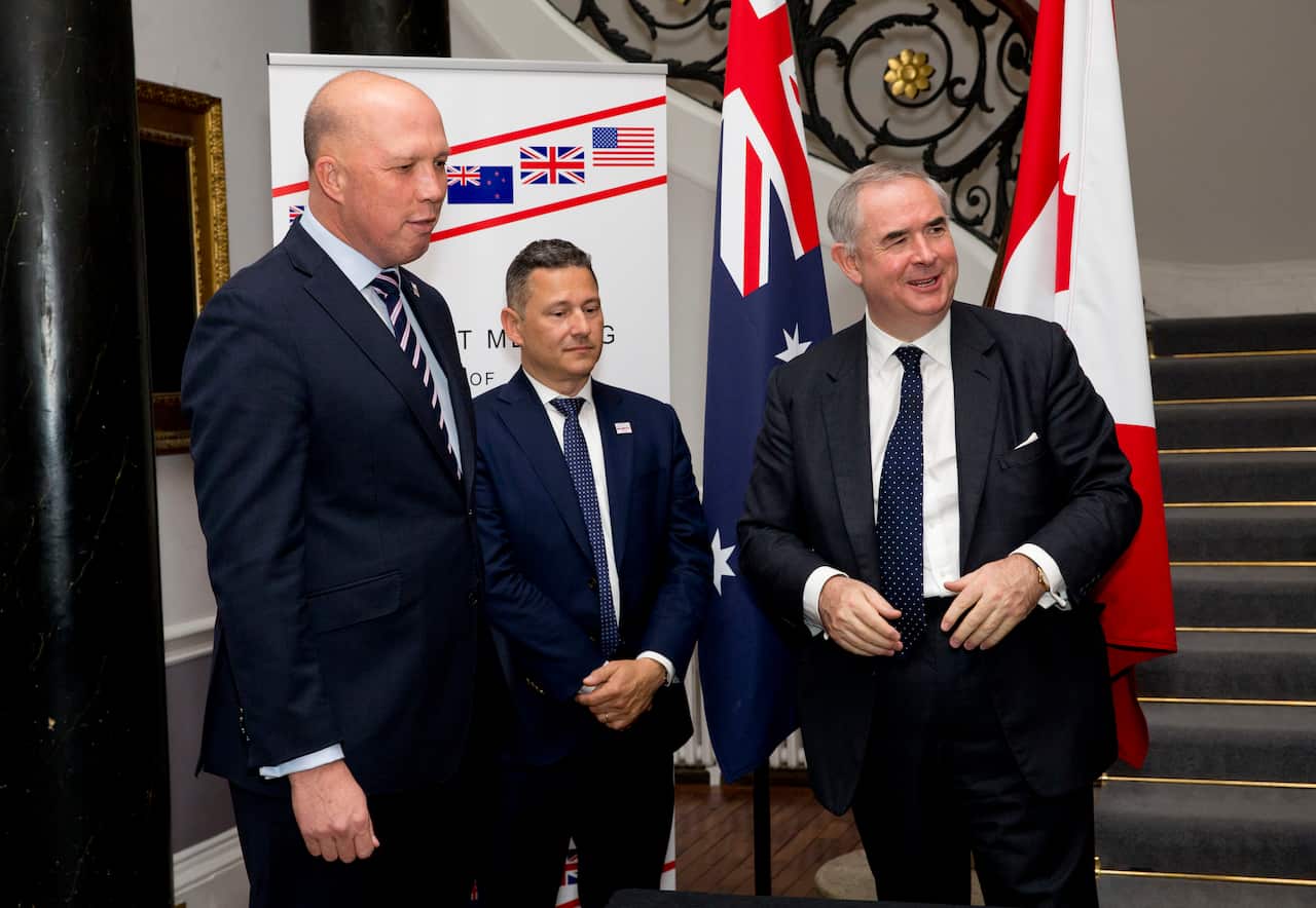 Mr Dutton, Canada's Justice Minister Francois Daigle and United Kingdom's Attorney General Geoffrey Cox.
