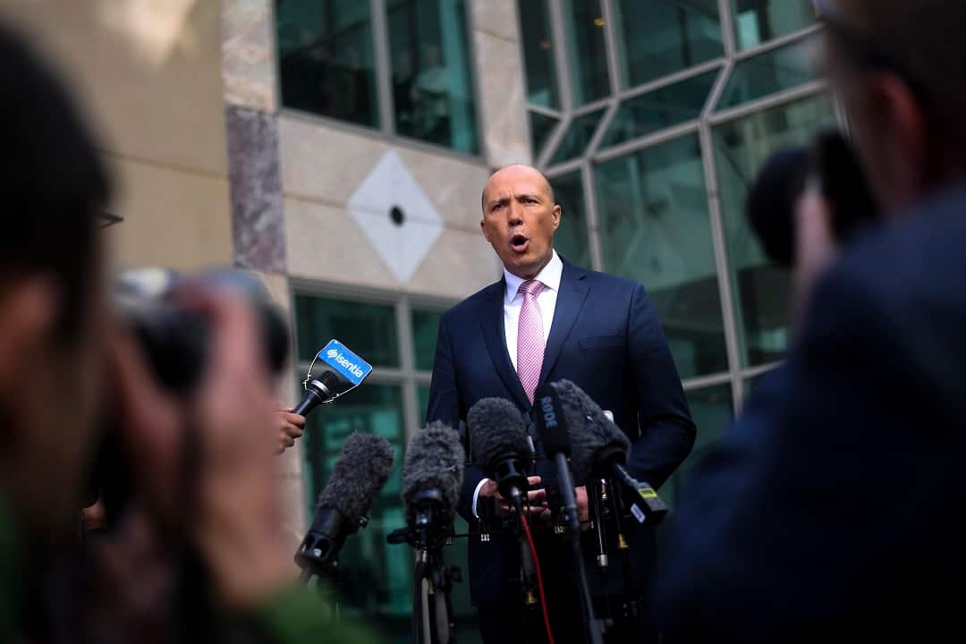 Former Australian Home Affairs Minister Peter Dutton speaks to the media during a press conference at Parliament House in Canberra, Tuesday, August 21, 2018. (AAP Image/Lukas Coch) NO ARCHIVING