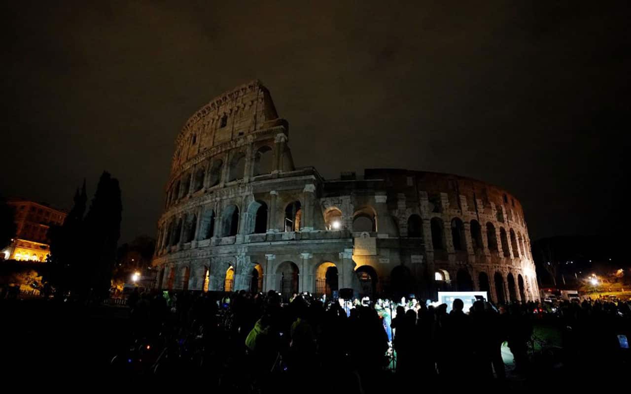 The ancient Colosseum in the dark during the Earth Hour.