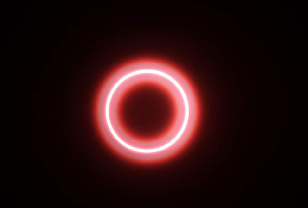 An annular solar eclipse is seen though safety glass from Siak, Riau province, Indonesia, 26 December 2019.  