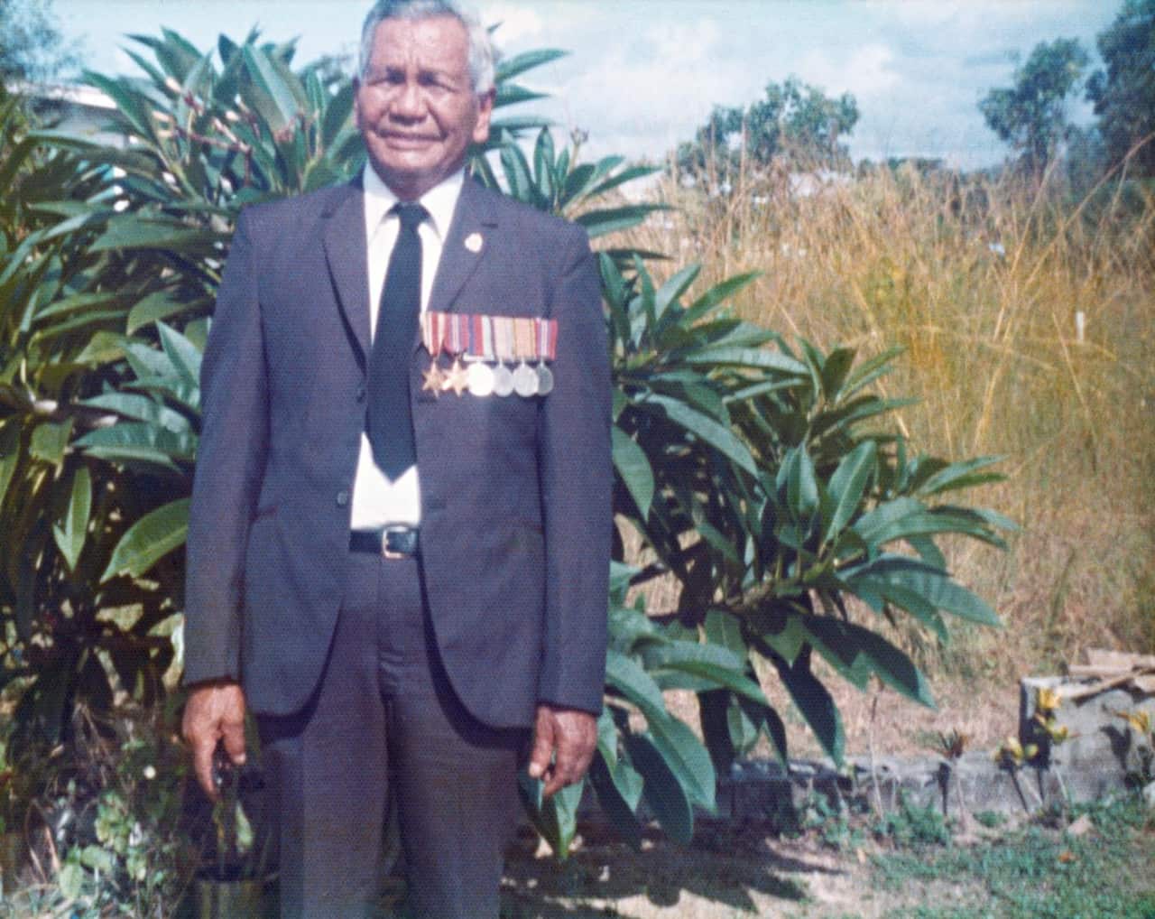 Eddie Albert in Cardwell with his service medals.