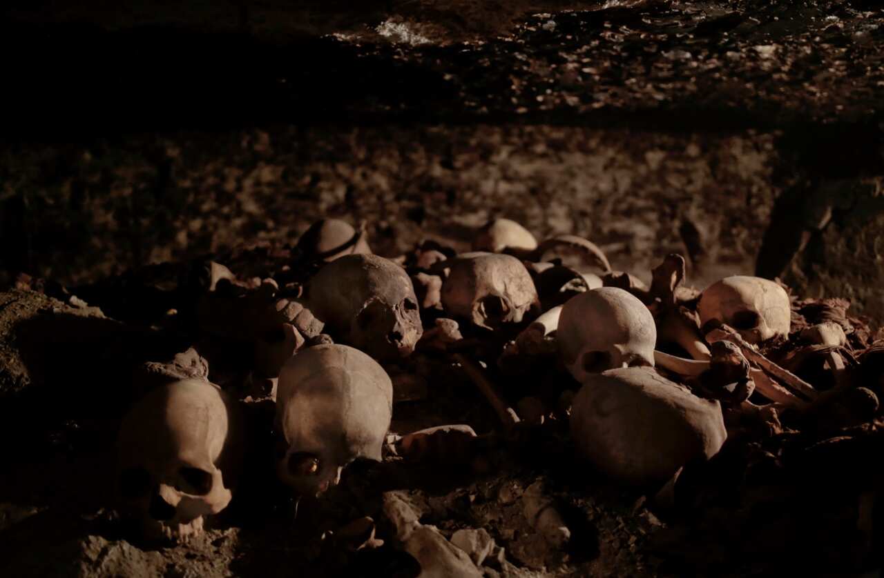Skulls found in the New Kingdom tomb that belongs to a royal goldsmith are illuminated in a burial shaft, in Luxor, Egypt, Saturday, Sept. 9, 2017 (AAP)