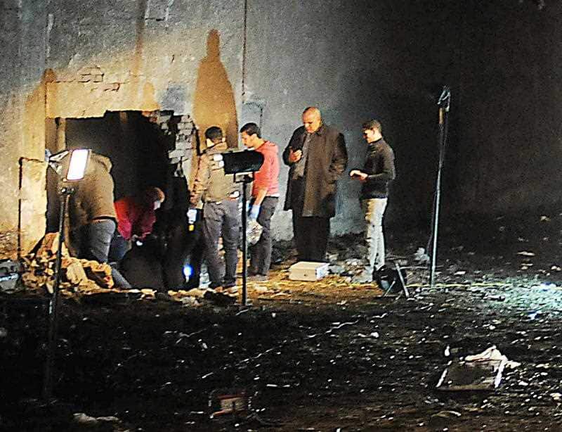 Egyptian security forces inspect the scene of the bombing  near Mariottia Corridor, Giza. 