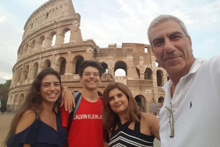 Elias Khoury, 15, with his sister and parents.