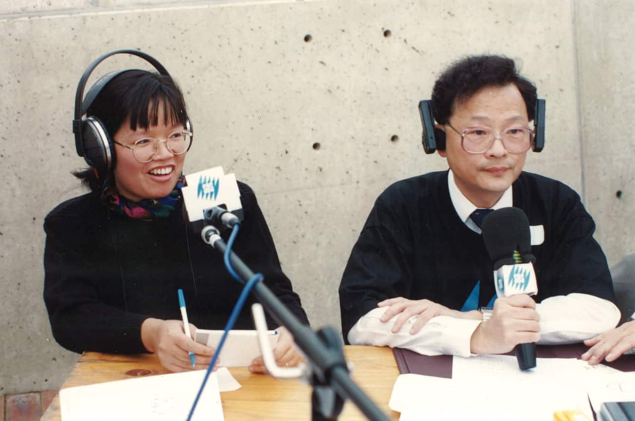 Elsa Tsang and Francis Lee from the Cantonese Program during a broadcast at Tumbalong Park 