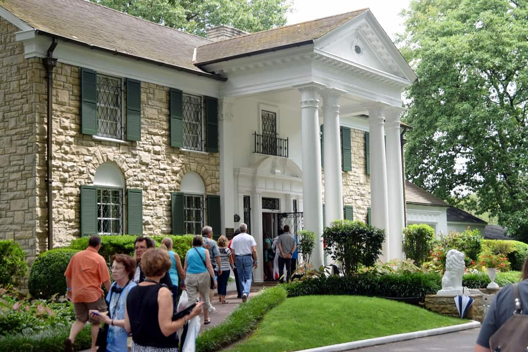 Fans of Elvis Presley visit his Graceland Mansion