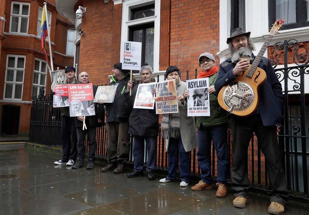Supporters of Julian Assange demonstrate outside the Ecuadorian embassy in London.