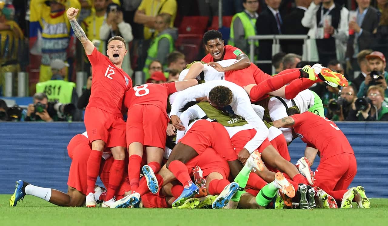 England players celebrate after winning the round of 16 match between Colombia and England 