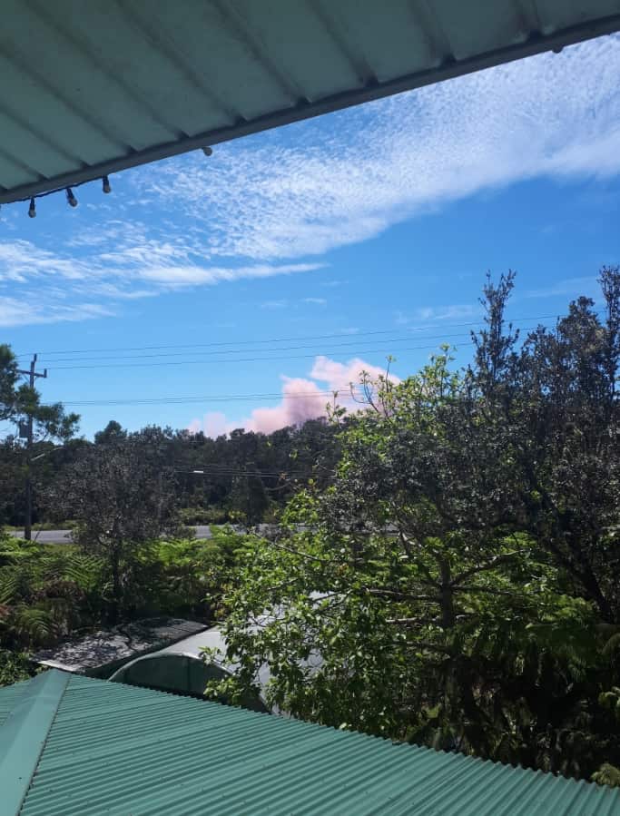 Pink ash rises in the sky as a 5.0-magnitude earthquake shook the Big Island in Hawaii amid ongoing seismic activity in Kilauea volcano