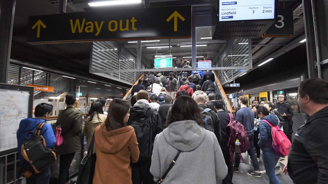 Commuters seen at Town Hall train station.