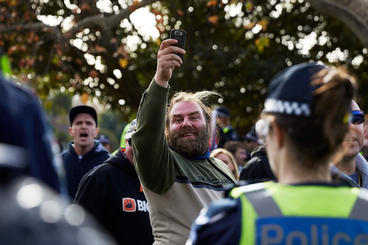 Phillip Galea (centre) at a far-right rally in Melbourne in 2016.