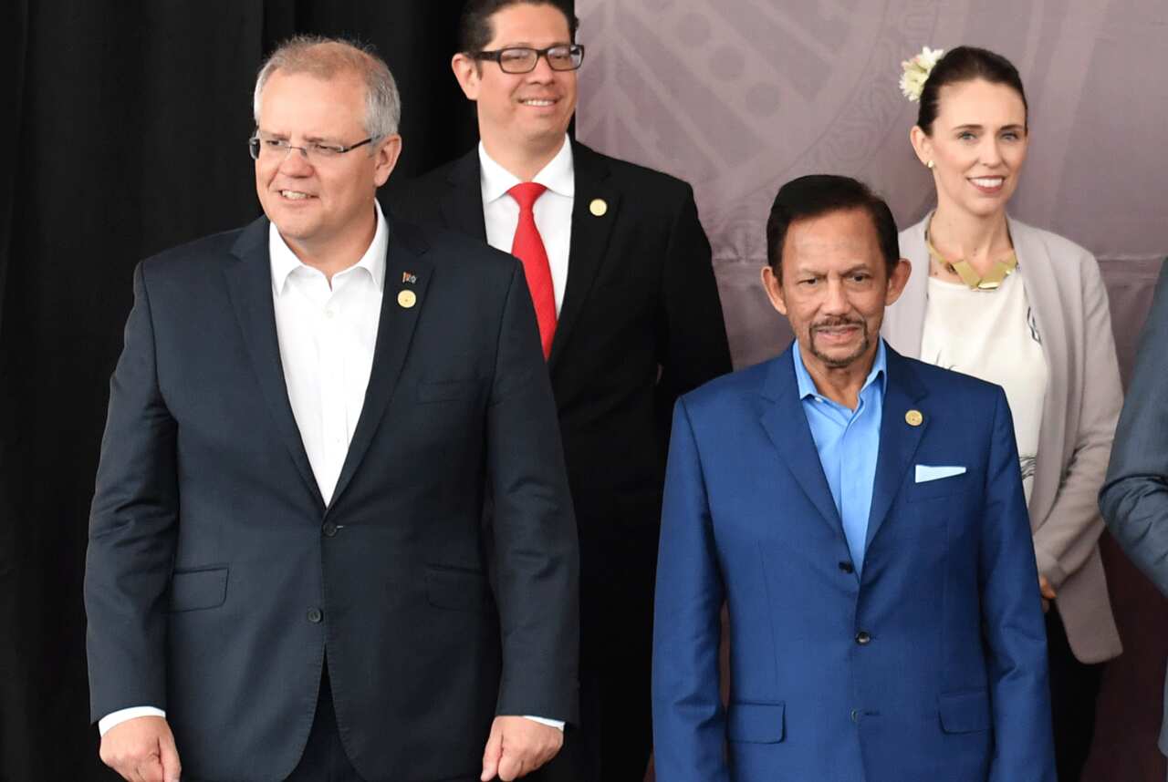 Scott Morrison and Brunei's Sultan Hassanal Bolkiah alongside other world leaders during the 2018 Asia-Pacific Economic Cooperation forum.