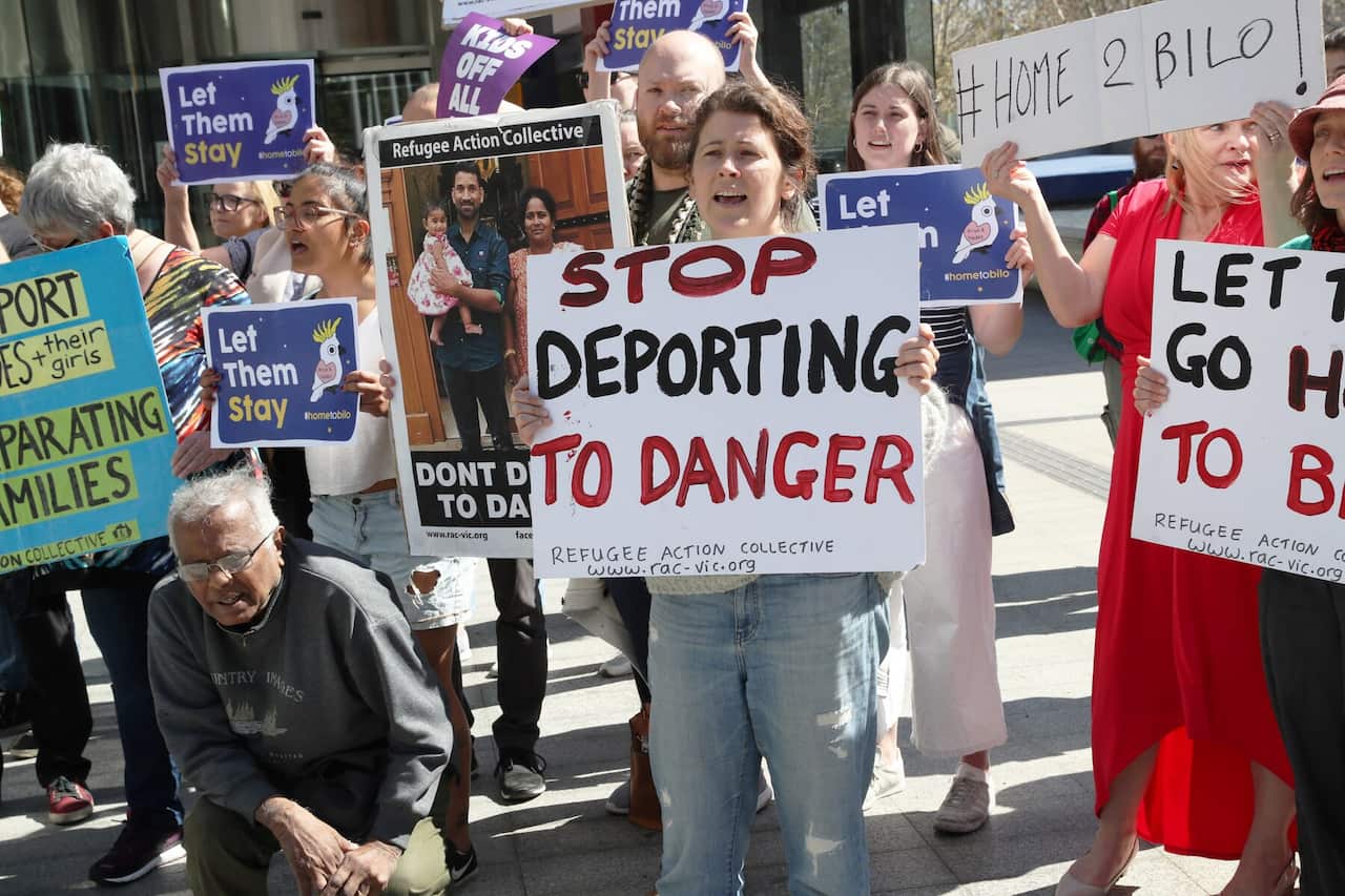 Supporters wait for the judgment for Biloela Tamil family facing deportation at a hearing in the Federal Court in Melbourne last year.