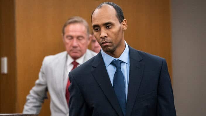 Mohamed Noor walks to the podium to be sentenced. He is now appealing his conviction.