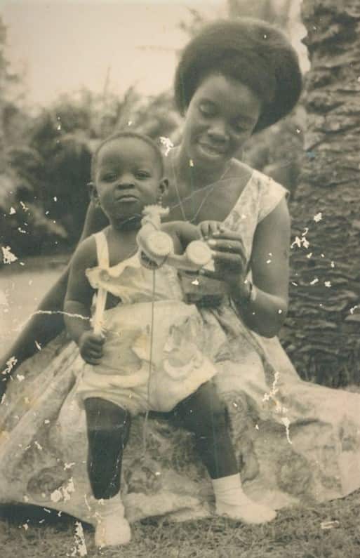 Florence Olugbemiro as a baby with her mother in Nigeria.