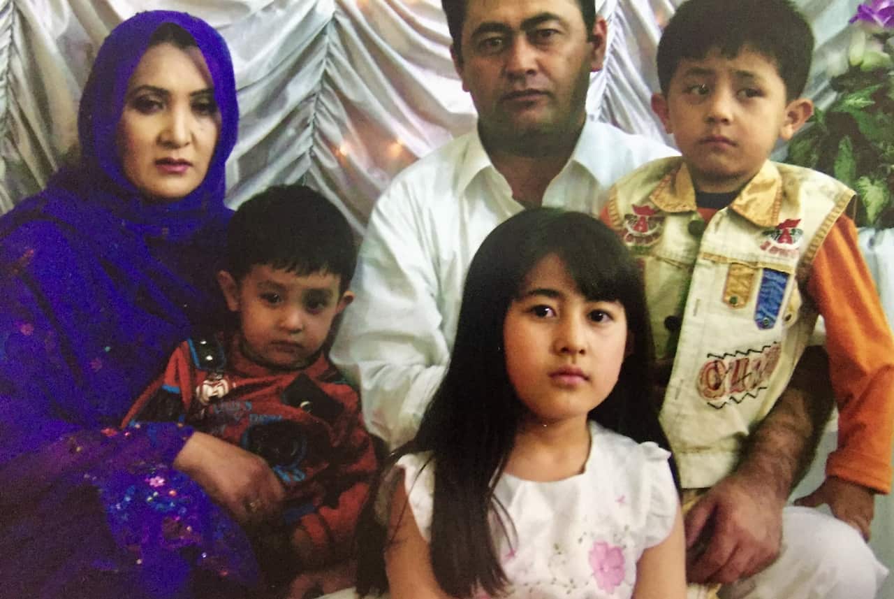 Hafizullah with his wife, daughter and two sons in Pakistan.