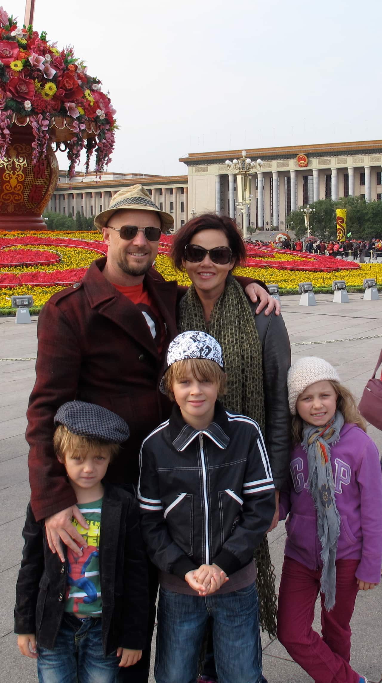 Anthony Maslin and Rin Norris with their children Otis, Mo and Evie. The three children were killed on flight MH17.