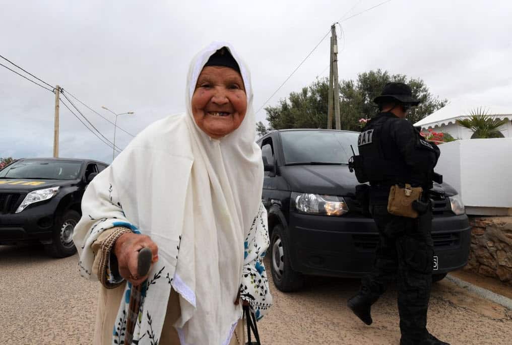 Fatma, 85, a Tunisian Muslim woman, visits the Ghriba synagogue in Tunisia's Mediterranean resort island of Djerba on the first day of the annual Jewish pilgrimage to the synagogue on May 2, 2018 (Getty Images)