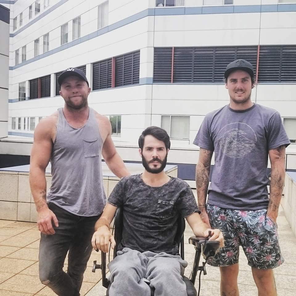 Martyn Dunn (centre) in rehabilitation