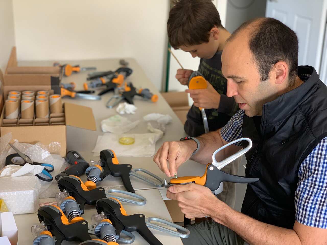 Robin Smith preparing his pain relief injecting device.