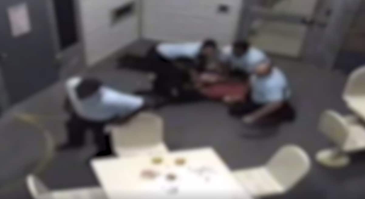 Mr FE had a tooth knocked loose as his head was forced on to the concrete floor.