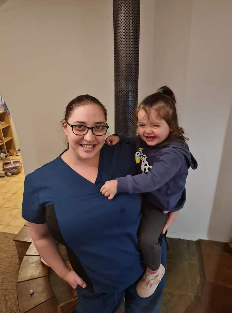 Felicity de Somerville holding her daughter.