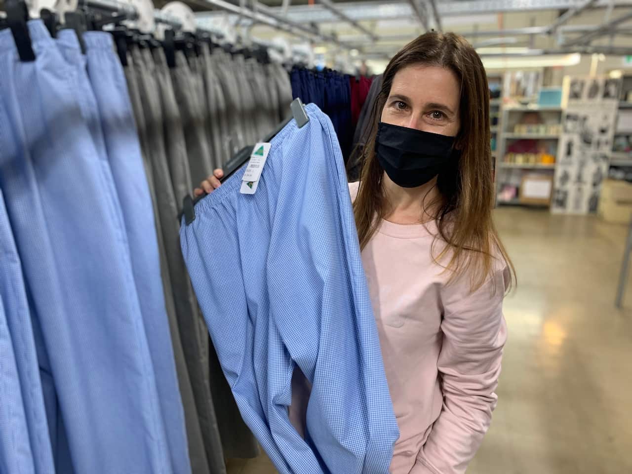 Former travel worker Lauren Owide is grateful to have a job at the factory.