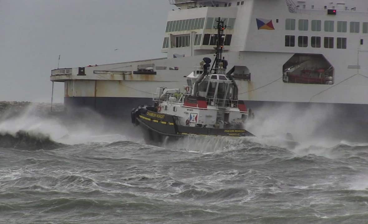 Authorities prepared the emergency evacuation of The Pride of Kent carrying 313 people after it ran aground at the French port city of Calais.