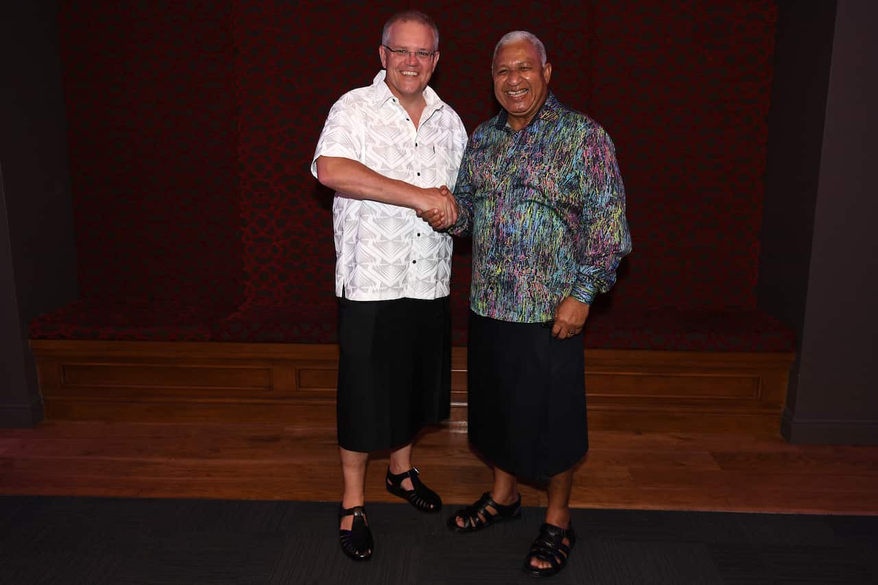 Australian Prime Minister Scott Morrison poses for a photograph with Prime Minister of Fiji Frank Bainimarama.