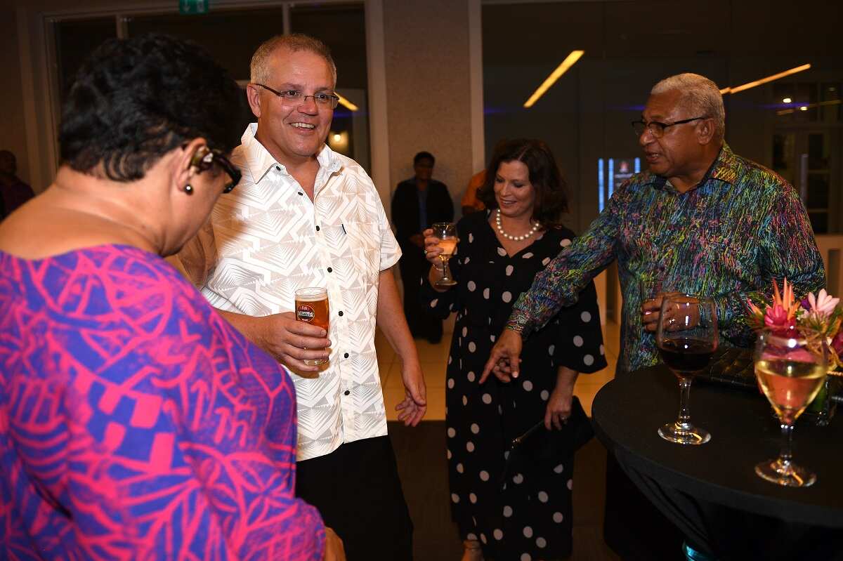 Australian Prime Minister Scott Morrison arrives in traditional Bula dress to an official dinner in Suva, Fiji, Thursday, January 17, 2019.