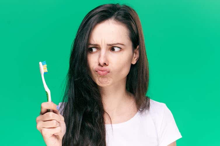 Brushing your teeth at least twice a day and flossing regularly can help to keep gum disease at bay.