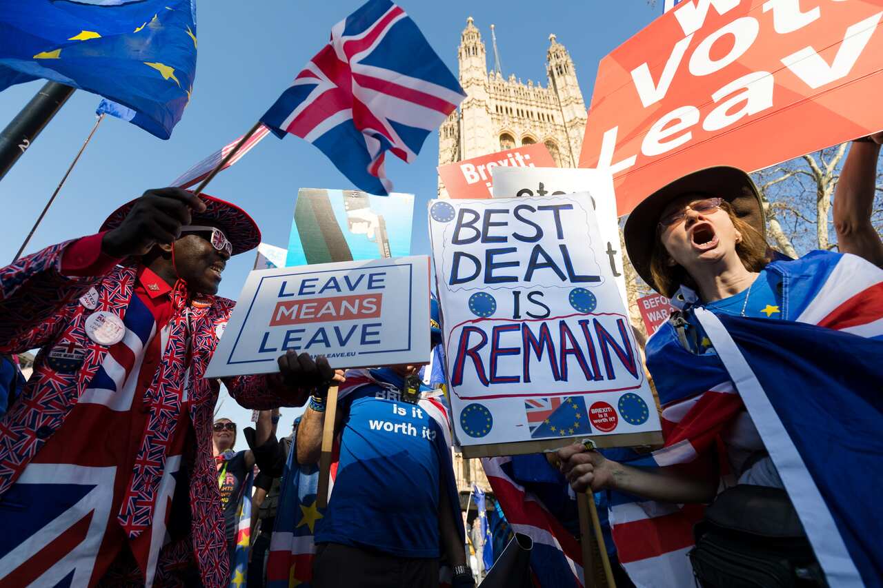 Brexit and anti Brexit protesters outside the Houses of Parliament in Westminster