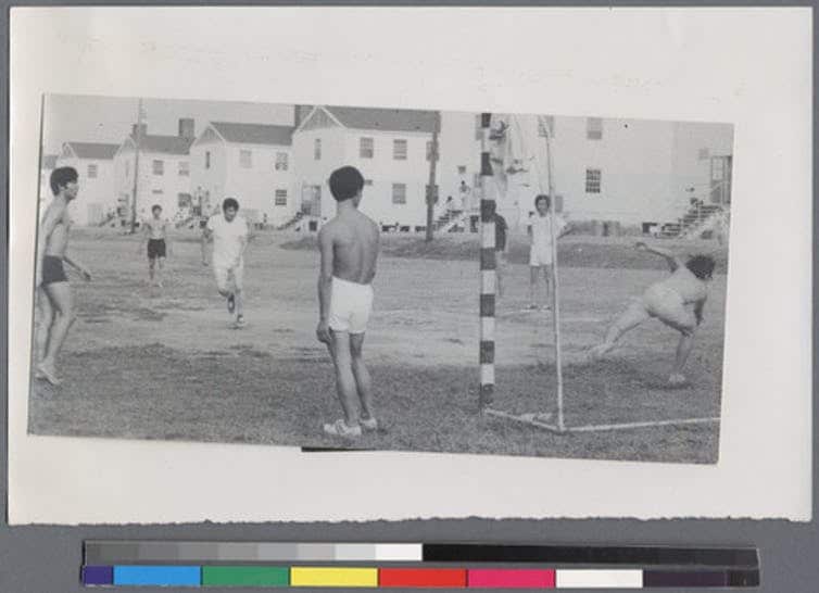Vietnamese boys play soccer at Fort Chaffee, Ark., in 1975.