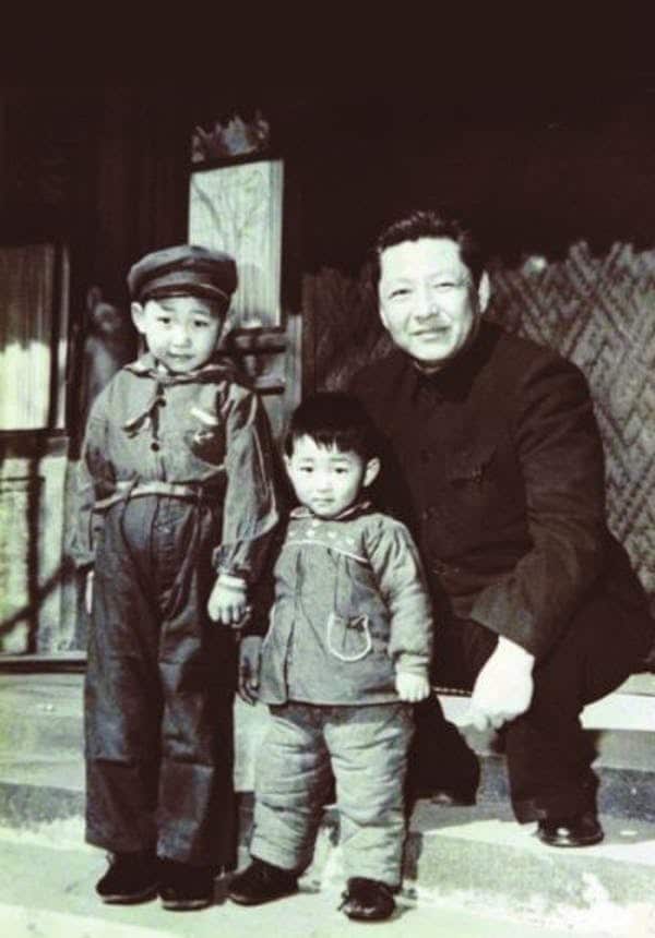 Xi Jinping (left) with his brother, Xi Yuanping, and father, Xi Zhongxun, in 1958.