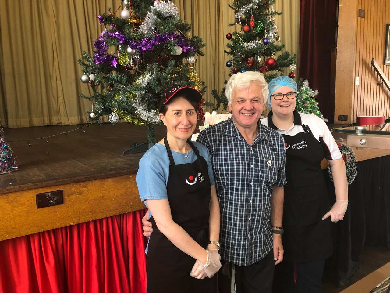 NSW Premier Gladys Berejiklian popped in to serve food to people in need on Christmas Eve.