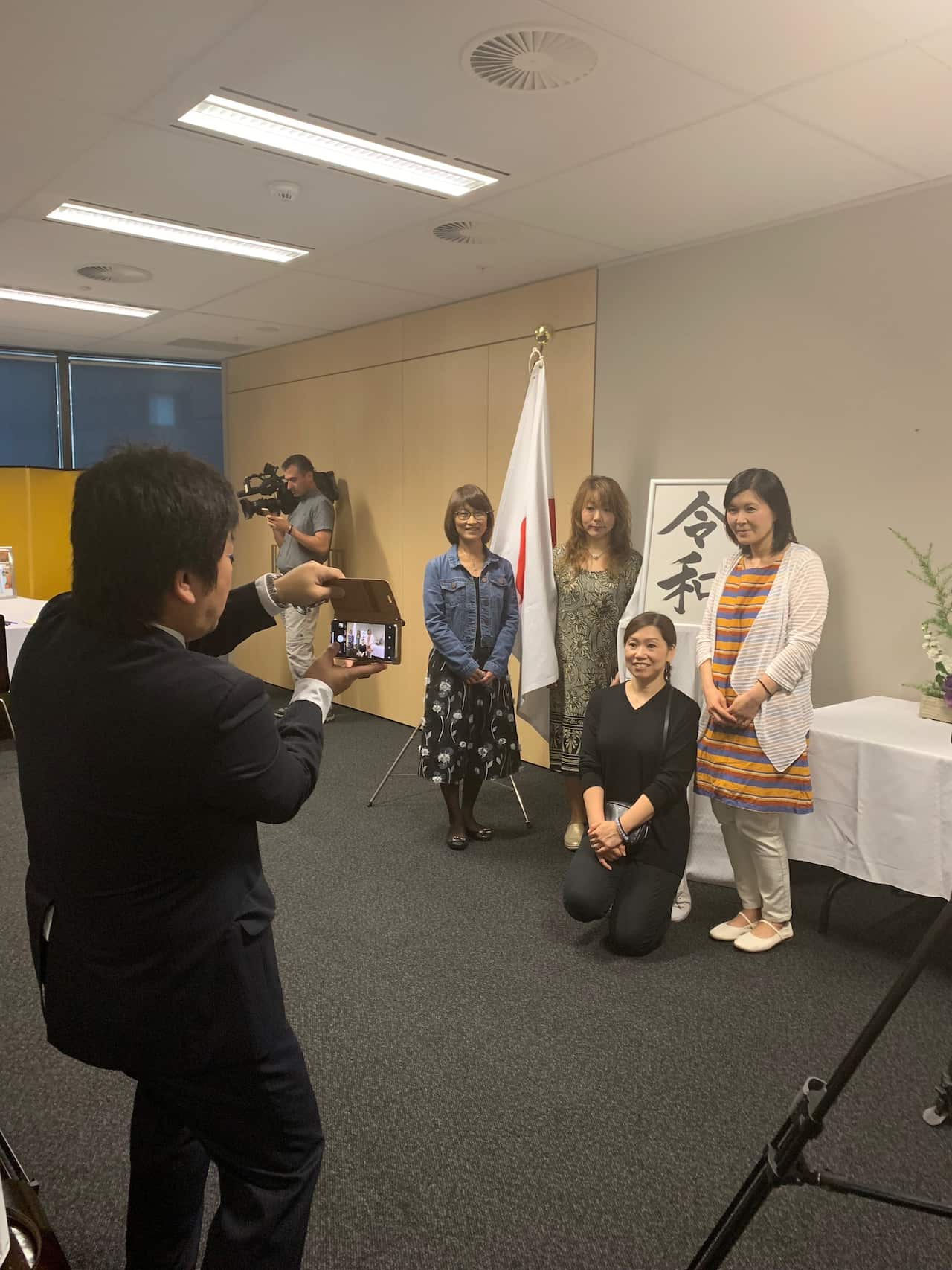 Well-wishers visit the Japanese Consulate in Sydney to send their congratulations to the new Emperor. 