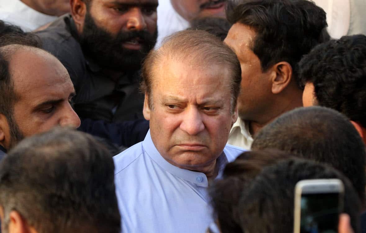 (FILE) - Nawaz Sharif (C), former Prime Minister of Pakistan, attends the funeral of his wife, Kulsoom Nawaz, in Lahore, Pakistan, 14 September 2018 (reissued 24 December 2018) (AAP)