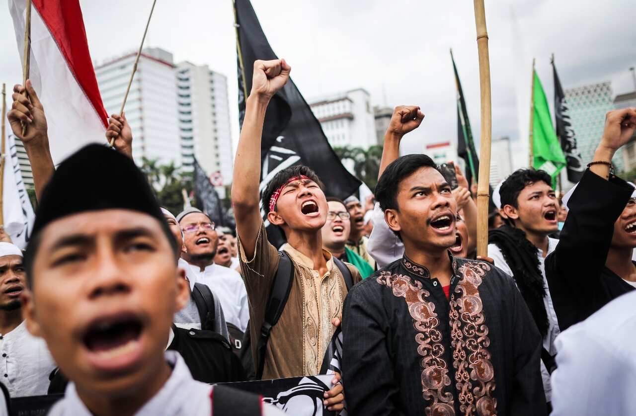 File image of Muslim protesters shouting slogans during a protest against Jakarta's governor in Indonesia, 31 March 2017. 
