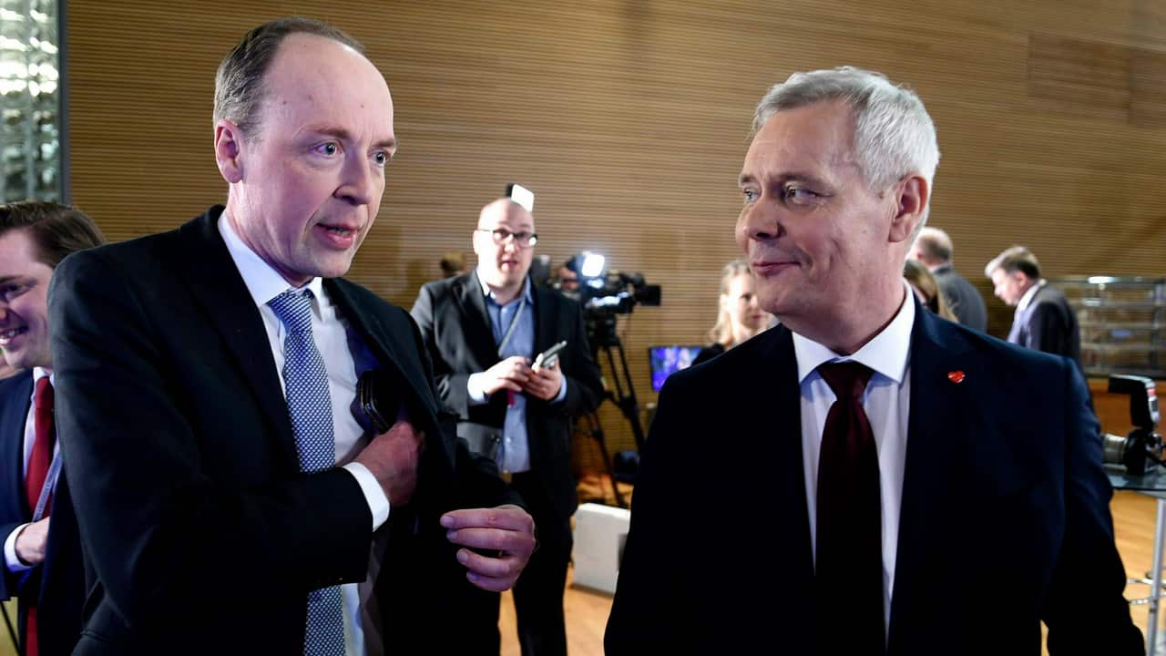 Chairman of The Finns Party Jussi Halla-aho (L) and Chairman of The Social Democratic Party Antti Rinne.